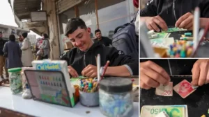 Filistinli genç eski ve yırtılmış banknotları onararak geçimini sağlıyor